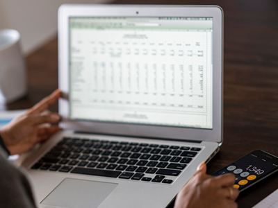 A computer showing a financial table