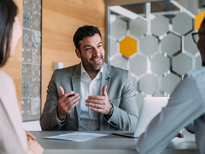 Person meeting with other professionals 